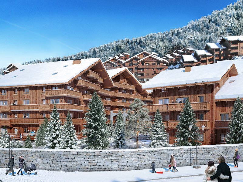 Chalets en bois et en pierre sous la neige à Méribel